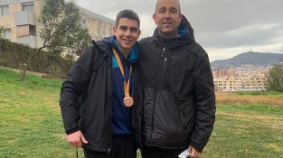 Daniel al costat del seu preparador, l'Oscar Sánchez