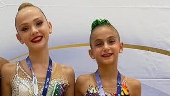 A l'esquerra, Plamelov (bronze)  i Saez (plata)